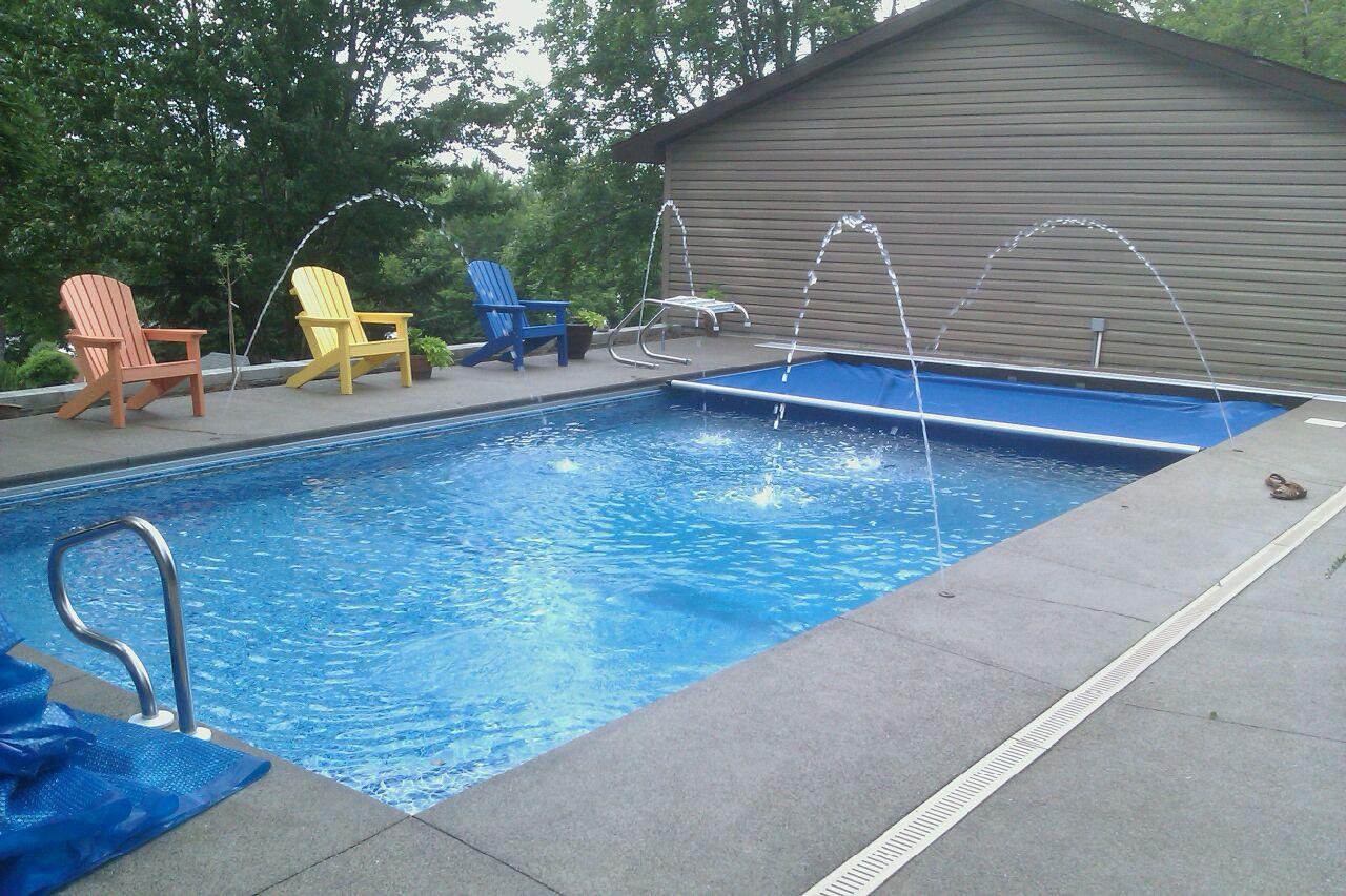 Finished in-ground pool with deck jets